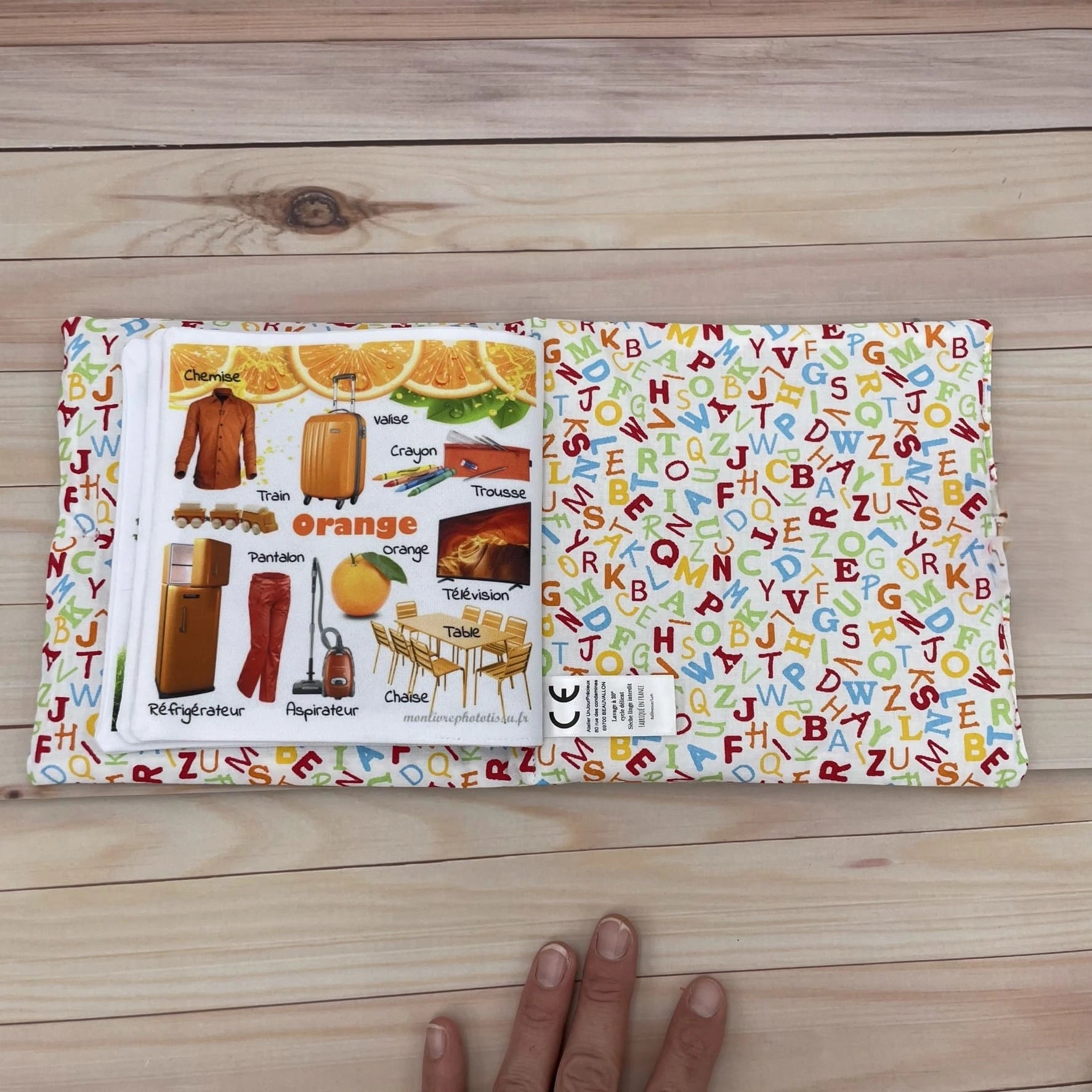 livre d'éveil imagier bébé apprentissage couleurs orange et mots